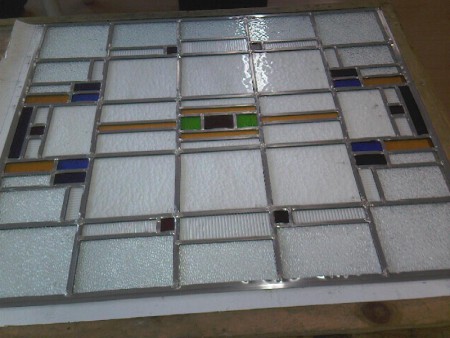 Restauratie van oud Glas in Lood paneel.